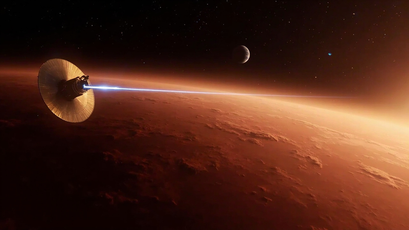 A relay spacecraft with a large dish antenna orbits above the rust-coloured limb of Mars, firing a thin blue beam along the planet's curve, with a small moon in the distance.