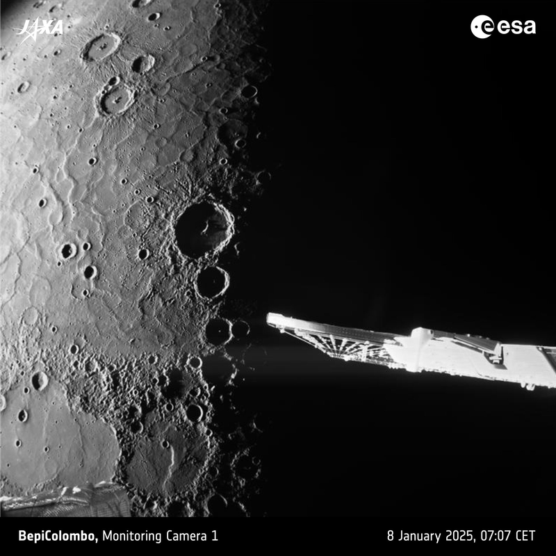 Mercury's cratered northern hemisphere in sharp relief with the spacecraft's solar array cutting across the right of the frame, photographed by BepiColombo's M-CAM 1 monitoring camera on 8 January 2025 during the sixth and final Mercury flyby