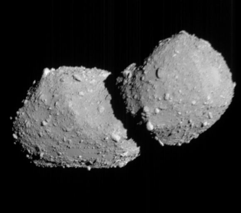 ONC-T image of asteroid Torifune captured by Hayabusa2 on July 5, 2026, showing the two-lobed contact-binary shape from a distance of roughly 800 kilometers.