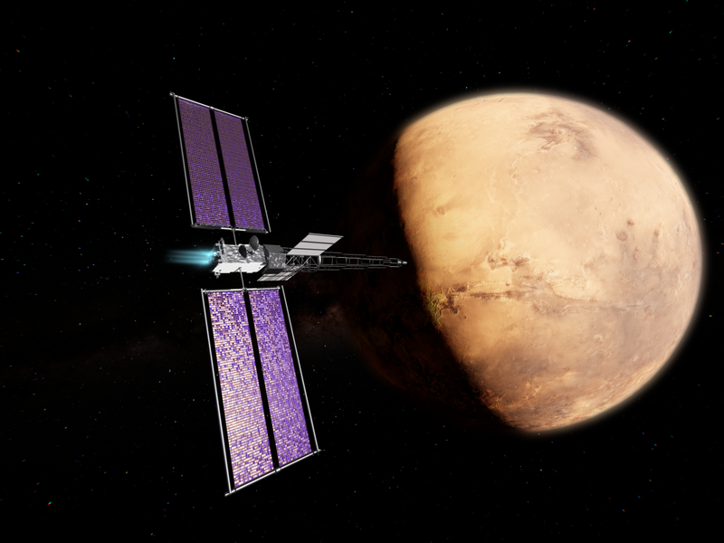 NASA artist's concept of Space Reactor-1 Freedom near Mars, with the reactor's long boom, gray radiator panels and purple-and-white solar arrays visible on the spacecraft.